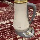 دلة كهربائية بكرتونها