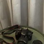 كاميرا كانون 1100D مستخدم