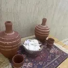 جره للماء مع الكوب