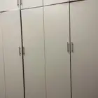 دولاب ملابس ابيض مع زاويه