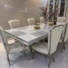 طاولة طعام بيضاء ثمان اشخاص