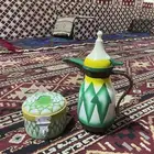 ترمز وساعه قديمه وفناجيل وقطعه تراثيه قديمه