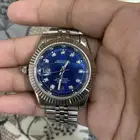 ساعه رولكس اصليه بس بدون ضمان وفتوره لأنها قديمه