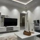 طاولة بلازما وطاولة خدمة بالوسط