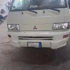 باص متسوبيشي موديل 2006