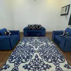 طقم كنب منسق مع سجاده وطاولة