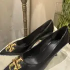 ساعات وجزمة توري بورتش