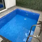 صيانة وتنظيف المسابح