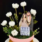 تنسيق فازة مع ورد صناعي وورد