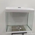 حوض اسماك مستخدم شبه جديد مع جميع مستلزماته واكل اسماك