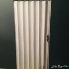 باب ابواب سحب سحاب سحابة جلد وبلاستيك كورديون