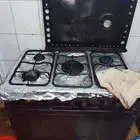 بوتجاز واسطوانة غاز وفرن كهربائي