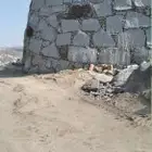 بكلين للاجار قص اراضي هد عماير وبناء جدران حجر في منطقه البا