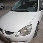 متسوبيسي لانسر بومة 2004