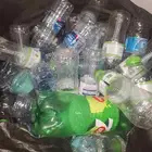 قوارير موية فارغه وعلب بيبسي