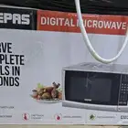 الصوره تتحدث مايكرويف geepas تطش بالكرتون