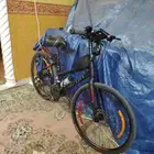 دراجة كوزون X3E