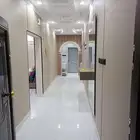 مدخل شقه تجليد الجدران بديل شيبورد مع مريا ورف