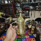 دلال قاسم طقم طبق الأصل