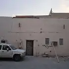 للبيع بيت شعبي في حي منفوحة المساحة 128 م