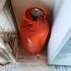 أسطوانة غاز مع المنظم
