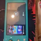 نينتندو سويتش لايت مع ملحقاته وكرت داكرة 256 وشاحن الاصلي