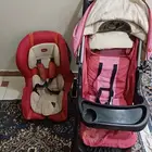 عربيه اطفال وكرسي سياره ماركه جونيور حالتهم ممتازه يشيل ل 25