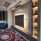 ديكور شاشه مع طاوله وارفف جانبيه الخلفيه ورق شيبورد