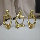 3 قطع من تمثال المفكر الذهبي  اثاث مكتبي