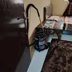 مكنسة كهربائية فوق الممتاز