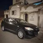 مزده cx9 2010