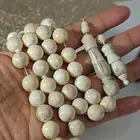 سبحة من النوادر .. ناب اسد طبيعي شرط