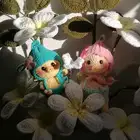 باقات ورد ودمى بخيوط القطيفة