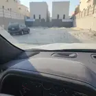 ارض في حى الندى 690م20 جنوب