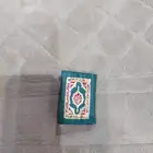 أصغر مصحف طوله واحد سم ونصف وعرضه واحد سم