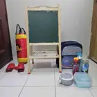 سبورة وكيس ملاكمة وحقيبة مدرسية