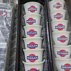 فناجيل شاهي وقهوة بشعار نيسان وداتسون