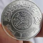 ريال الملك عبدالعزيز فضه وريالات الملك فيصل .