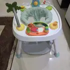 كرسي ومشاية أطفال