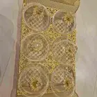 تبسي حلويات ذهبي بكريستالات