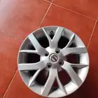 جنوط نيسان صني اصليه مقاس 15