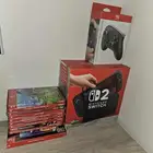 (نينتيندو سويتش 2) مع 10 اشرطه و يد برو