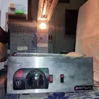 شوايه وقلايه برجر كهربائيه 220 ف استنلس جديده بقراطيسها