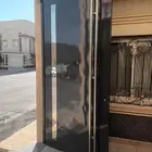 دهان ابواب حديد زيتي اللون رمادي غامق