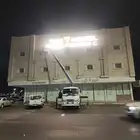 Crane of workers. Running a basket.