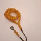 مسبحة كهرمان مغلفة ومنوصف
