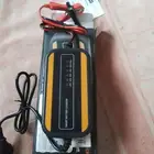 جهاز شحن البطارية من الكهرب