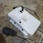 طابعة فواتير وقارئ باركود وماكينة عد نقود