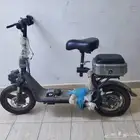 سكوتر ابو سلة مقاس 14ألون اسود