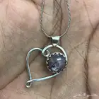 تعليقه فضه بفص ياقوت نجمي